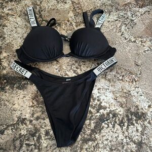 Victoria’s Secret black swimsuit, bra size 34A, bottom size S, worn once.
